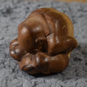 Carved Man Meditating/Praying Sculpture